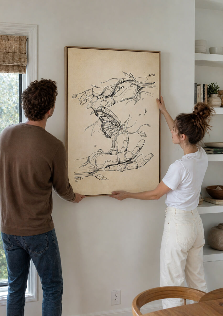 Couple hanging large butterfly wall art above sofa, real home installation scene, modern interior