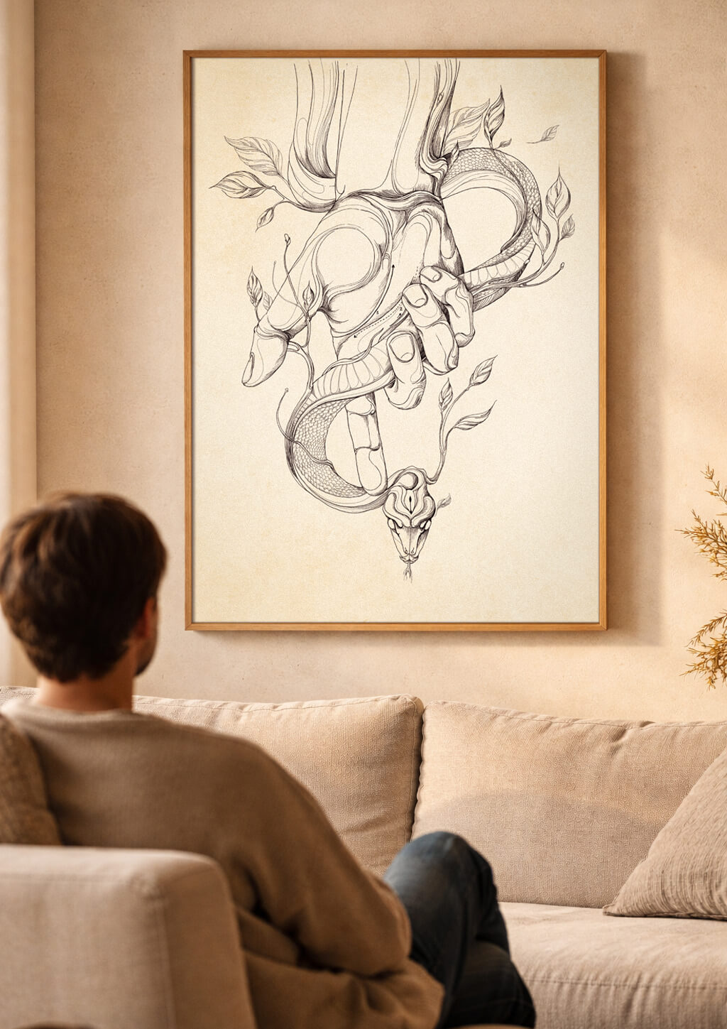 large snake wall art above sofa Prometheus awareness artwork in warm minimalist living room